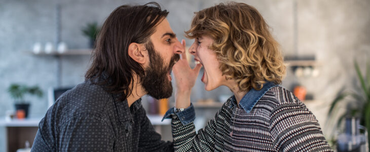 Man and woman, married couple arguing at home.