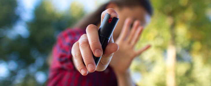 Self-defense woman protects herself in the park