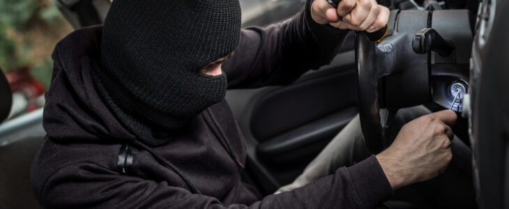 Car Thief tries to start the car with a screwdriver in the ignition