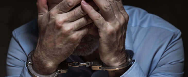 Portrait of arrested businessman